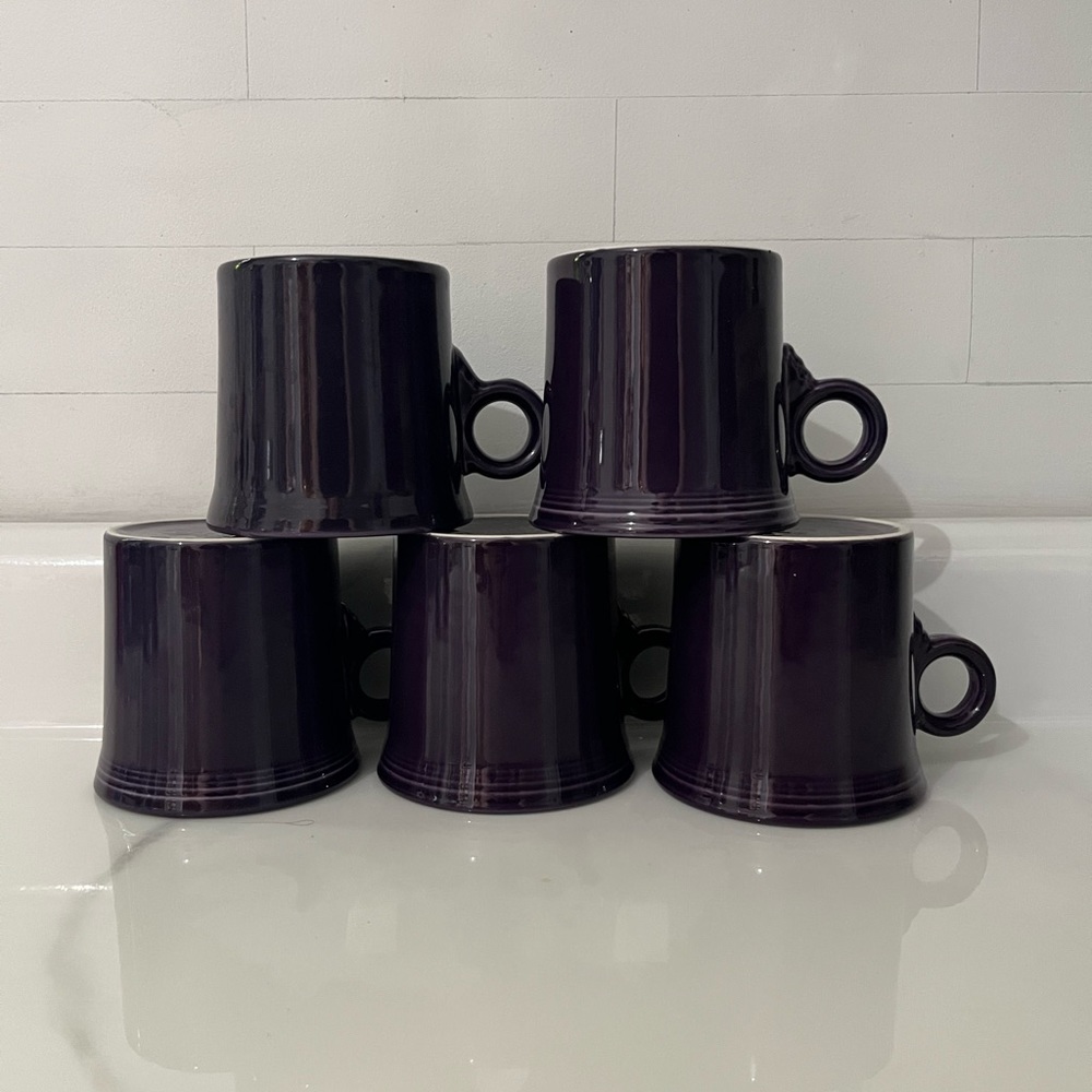 Five retired Plum Fiestaware coffee mugs/cups